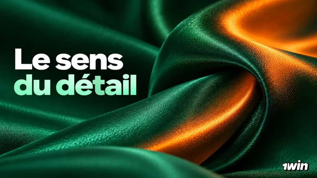 Plis de tissu vert et orange accompagnés d’un slogan sur le détail
